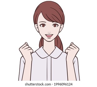 A nurse doing a guts pose with a smile