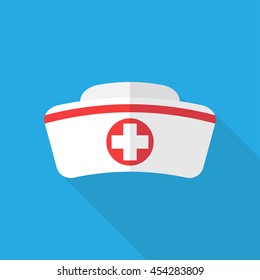 Nurse hat with cross isolated on blue background. Flat icon. Nurse hat closeup