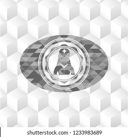 nurse icon inside grey emblem with geometric cube white background