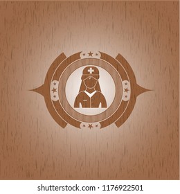 nurse icon inside retro style wood emblem