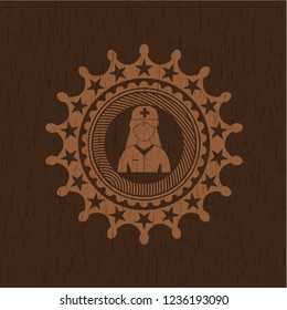 nurse icon inside vintage wood emblem