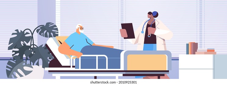 nurse taking care of sick senior man patient lying in hospital bed care service concept horizontal