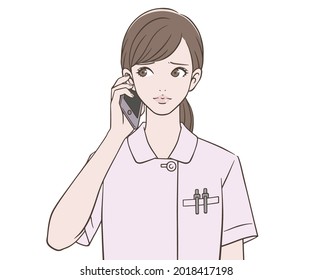 Eine Krankenschwester in Schwierigkeiten mit einem Smartphone