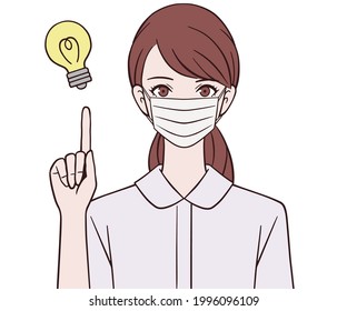 A nurse wearing a mask and raising her index finger