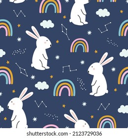 nursery seamless pattern rabbit with the sky and rainbow on blue background for print, wallpaper, textile, vector illustration
