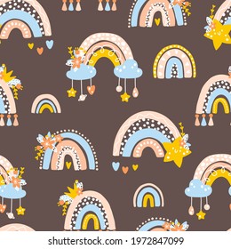 Nursery seamless pattern with rainbows, planets, clouds. Vector background with cute baby shower elements in simple hand-drawn Scandinavian cartoon doodle style. Limited pastel palette for printing