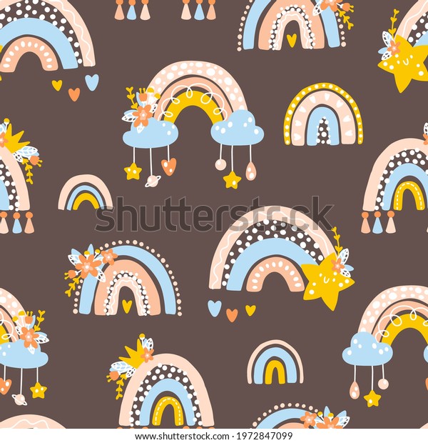 Nursery seamless pattern with rainbows, planets,\
clouds. Vector background with cute baby shower elements in simple\
hand-drawn Scandinavian cartoon doodle style. Limited pastel\
palette for printing