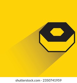 nut bolt with shadow on yellow background