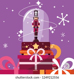 nutcracker soldier in crystal sphere with gift boxes presents