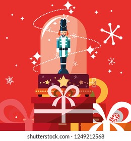 nutcracker soldier in crystal sphere with gift boxes presents