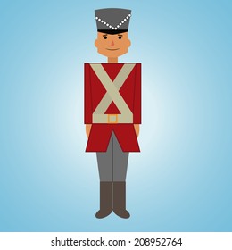 a nutcracker soldier toy on a blue background