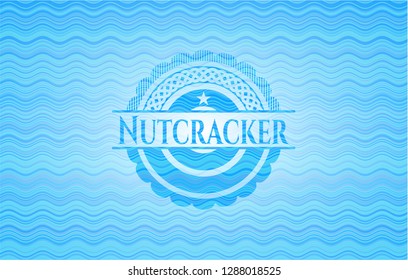 Nutcracker water representation badge.
