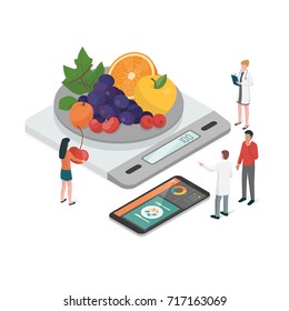 Nutritionists planning a diet using a food measuring scale and a food app on the smartphone, diet and nutrition concept