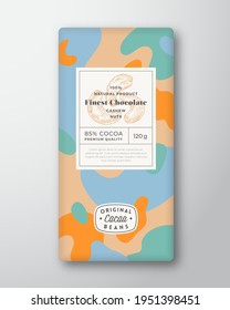 Nuts Chocolate Label Abstract Shapes Vector Packaging Design Layout with Realistic Shadows. Modern Typography Hand Drawn Cashew Silhouette and Colorful Camouflage Pattern Background. Isolated.