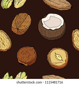 a lot of nuts on a brown background. nuts in chocolate