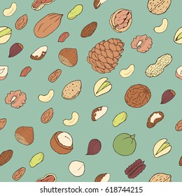 Nuts on green background. Seamless pattern. Hand drawn vector illustration.