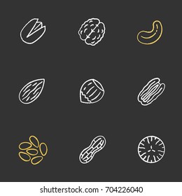 Nuts types chalk icons set. Pistachio, walnut, cashew and pecan nuts, almond, hazelnut, pinenuts, peanut, nutmeg. Isolated vector chalkboard illustrations