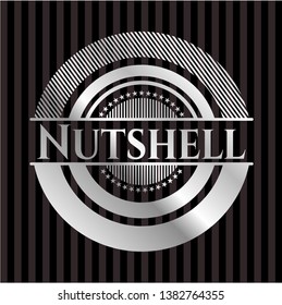 Nutshell silver emblem or badge. Vector Illustration. Mosaic.