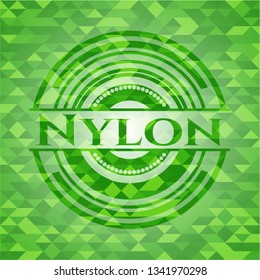 Nylon green emblem. Mosaic background