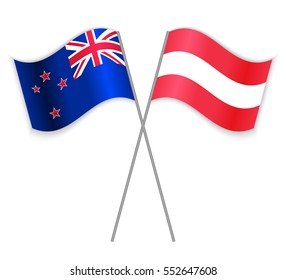NZ and Austrian crossed flags. New Zealand combined with Austria isolated on white. Language learning, international business or travel concept.