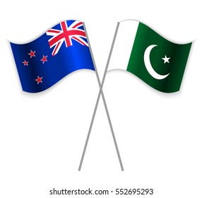 NZ and Pakistani crossed flags. New Zealand combined with Pakistan isolated on white. Language learning, international business or travel concept.