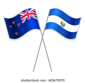 NZ and Salvadoran crossed flags. New Zealand combined with El Salvador isolated on white. Language learning, international business or travel concept.