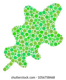 Oak Leaf collage of dots in various sizes and ecological green shades. Vector round dots are united into oak leaf illustration. Ecology vector illustration.