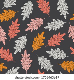 Oak leaf silhouettes isolated on background seamless pattern. Vector illustration with decorative leaves, design for textile, fabric, wallpaper.