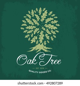 Oak tree handmade shabby logo design concept on green background. Web graphics modern vector sign. Vintage quality organic goods co. illustration.