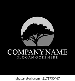 Oak tree logo illustration. Vector silhouette of a tree