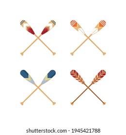 Oars set isolated on a white background. Crossed paddles in flat style, vector illustration.