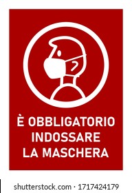 È Obbligatorio Indossare La Maschera ("It is Obligatory to Wear a Face Mask" in Italian) Sign against the Spread of the Novel Coronavirus Covid-19. Vector Image.