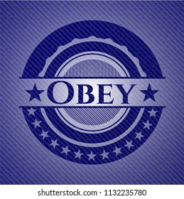 Obey emblem with jean background