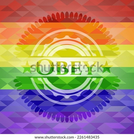 Obey emblem on mosaic background with the colors of the LGBT flag. 