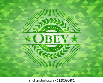 Obey green emblem with mosaic background