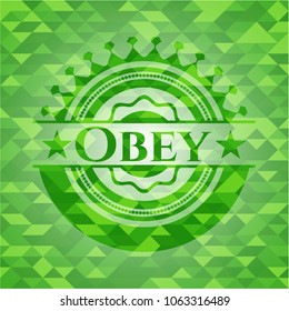 Obey green emblem with triangle mosaic background