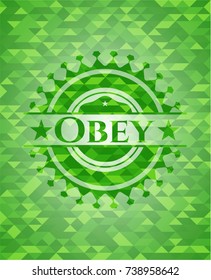 Obey green emblem with triangle mosaic background