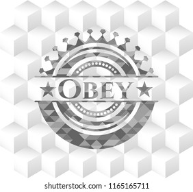 Obey grey badge with geometric cube white background