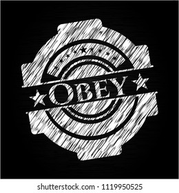 Obey on chalkboard