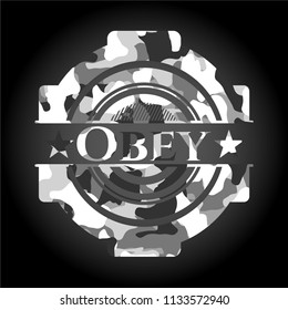 Obey on grey camouflaged texture