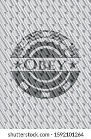 Obey shiny silver emblem. Scales pattern. Vector Illustration. Detailed.