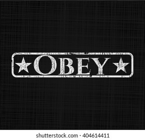 Obey written with chalkboard texture