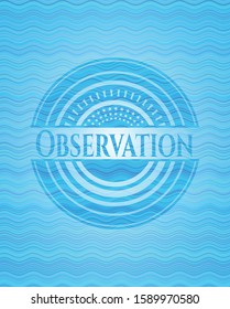 Observation light blue water style emblem. Vector Illustration. Detailed.