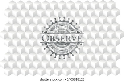 Observe realistic grey emblem with geometric cube white background