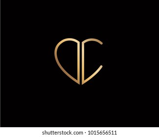 OC initial heart shape gold colored logo