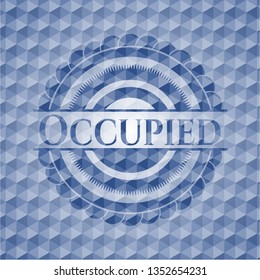 Occupied blue hexagon badge.