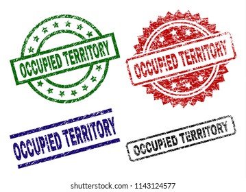 OCCUPIED TERRITORY seal prints with damaged texture. Black, green,red,blue vector rubber prints of OCCUPIED TERRITORY label with dirty texture. Rubber seals with circle, rectangle, medal shapes.