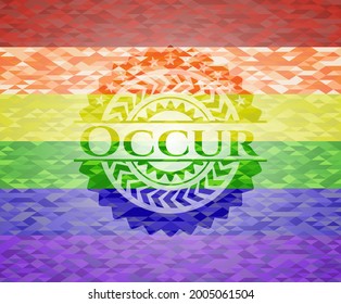 Occur emblem on mosaic background with the colors of the LGBT flag. 