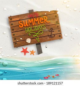 Ocean and Beach Sand. Wooden Plaque with "Enjoy Summer Holidays" Lettering. Sunshine. Sea shells, anchor and starfish on the beach. Sand as background for summer design. Calligraphic design element.