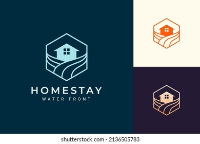 Ocean or beach theme resort logo in simple line and hexagon shape